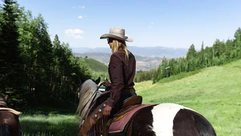 Woman horseback riding at Deer Valley.