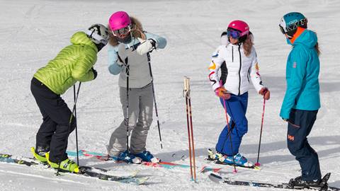 Group of women attending ski clinic.