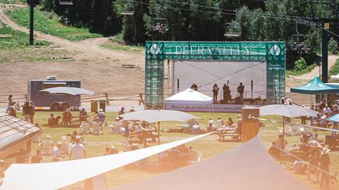 Band performing live music at Deer Valley's Silver Lake Lawn event in the summer.