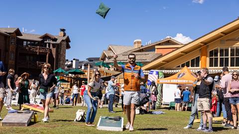 A person playing outdoor games at the Deer Valley Mountain Beer Festival.