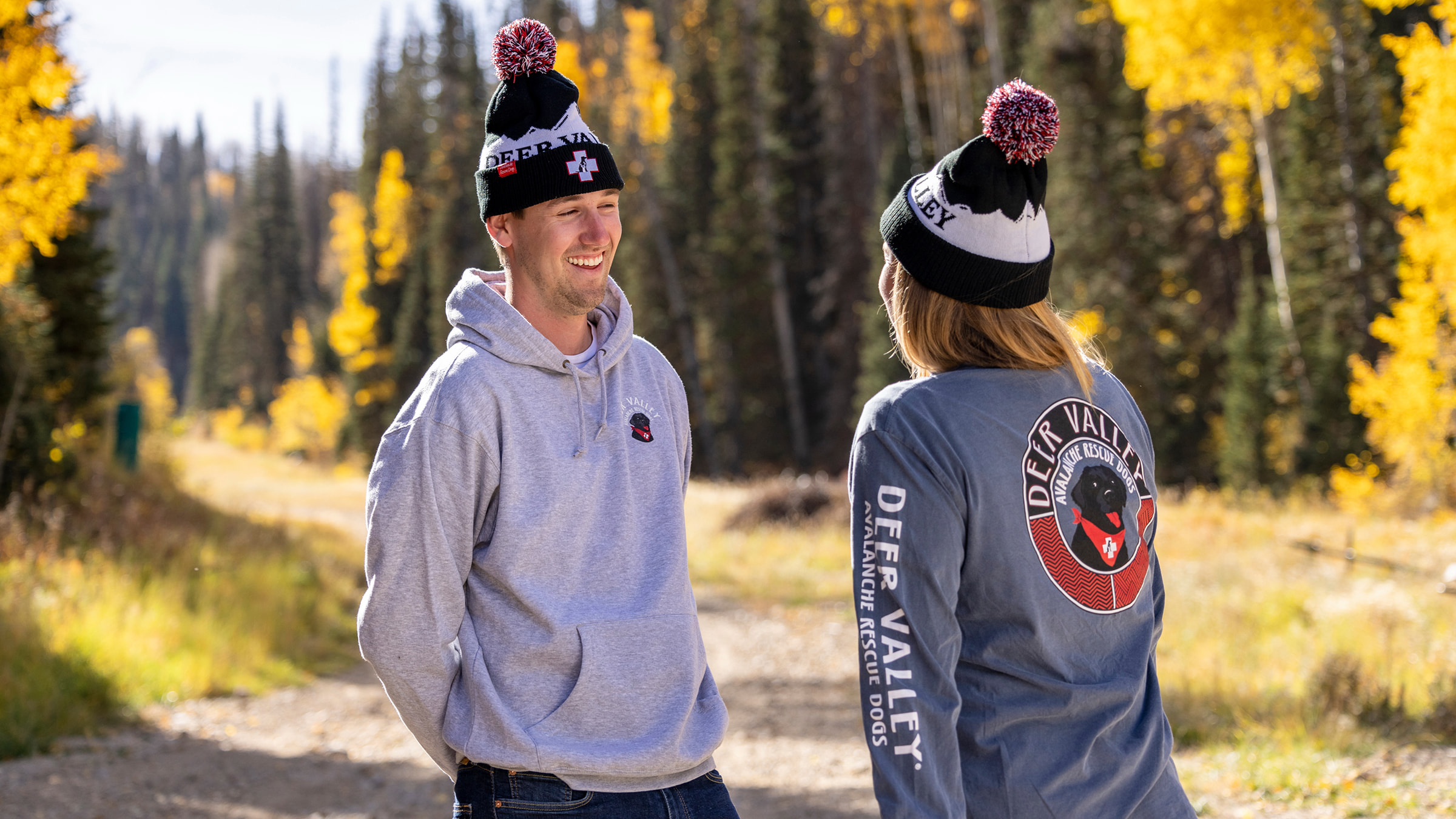 Couple wearing Deer Valley Signatures sweaters. 