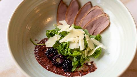 Plated French dish prepared by Chef Clement Gelas.