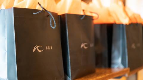 KJUS gift bags handed out during Taste of Luxury event.