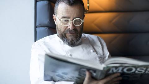 Chef Morelli reading a book.
