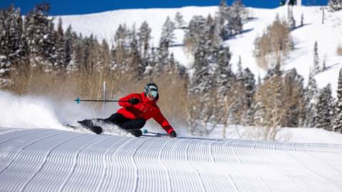 Ted Ligety skiing at Deer Valley on bluebird day.