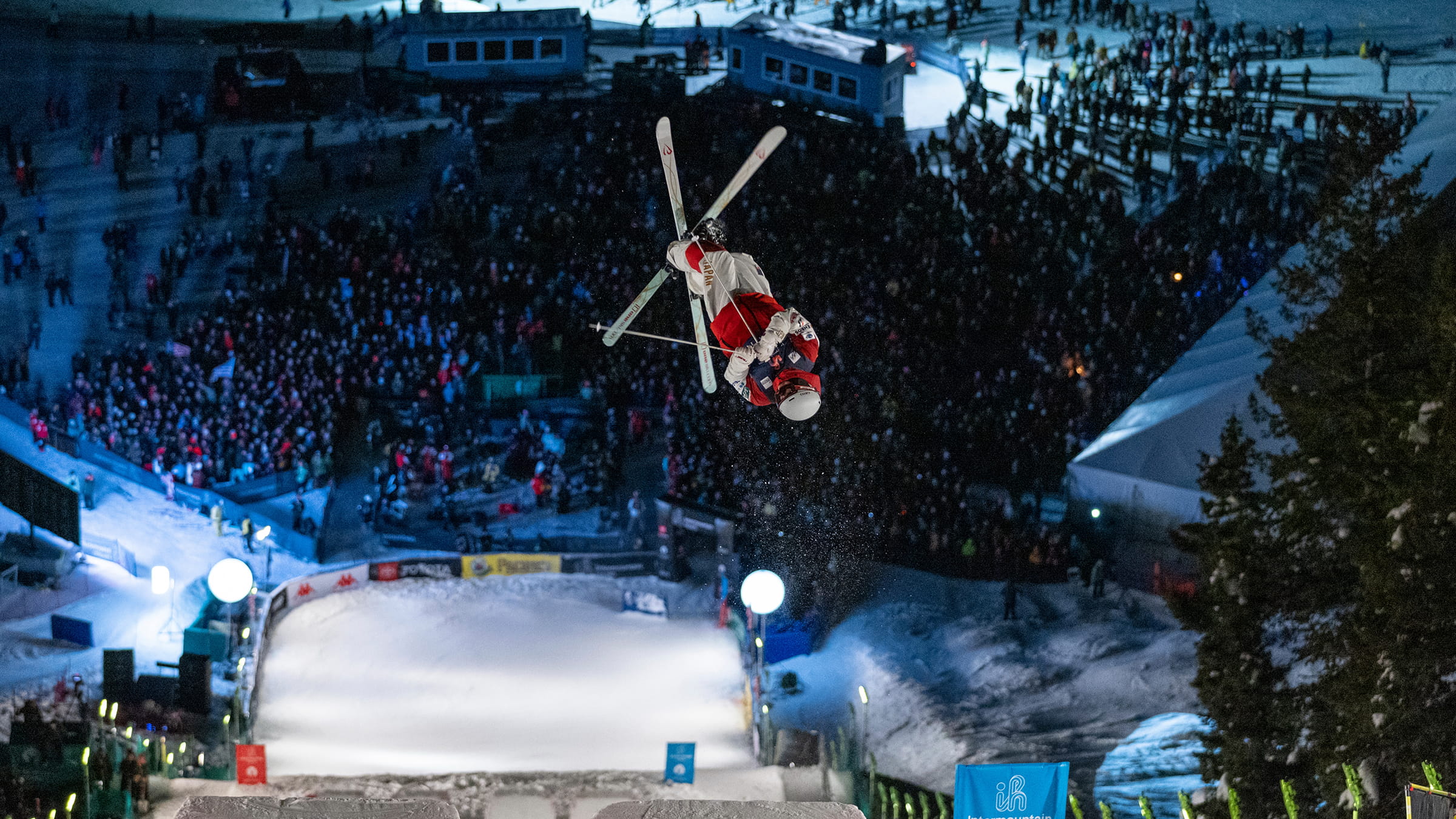 Athlete competing in Intermountain Health Ski World Cup moguls competition.