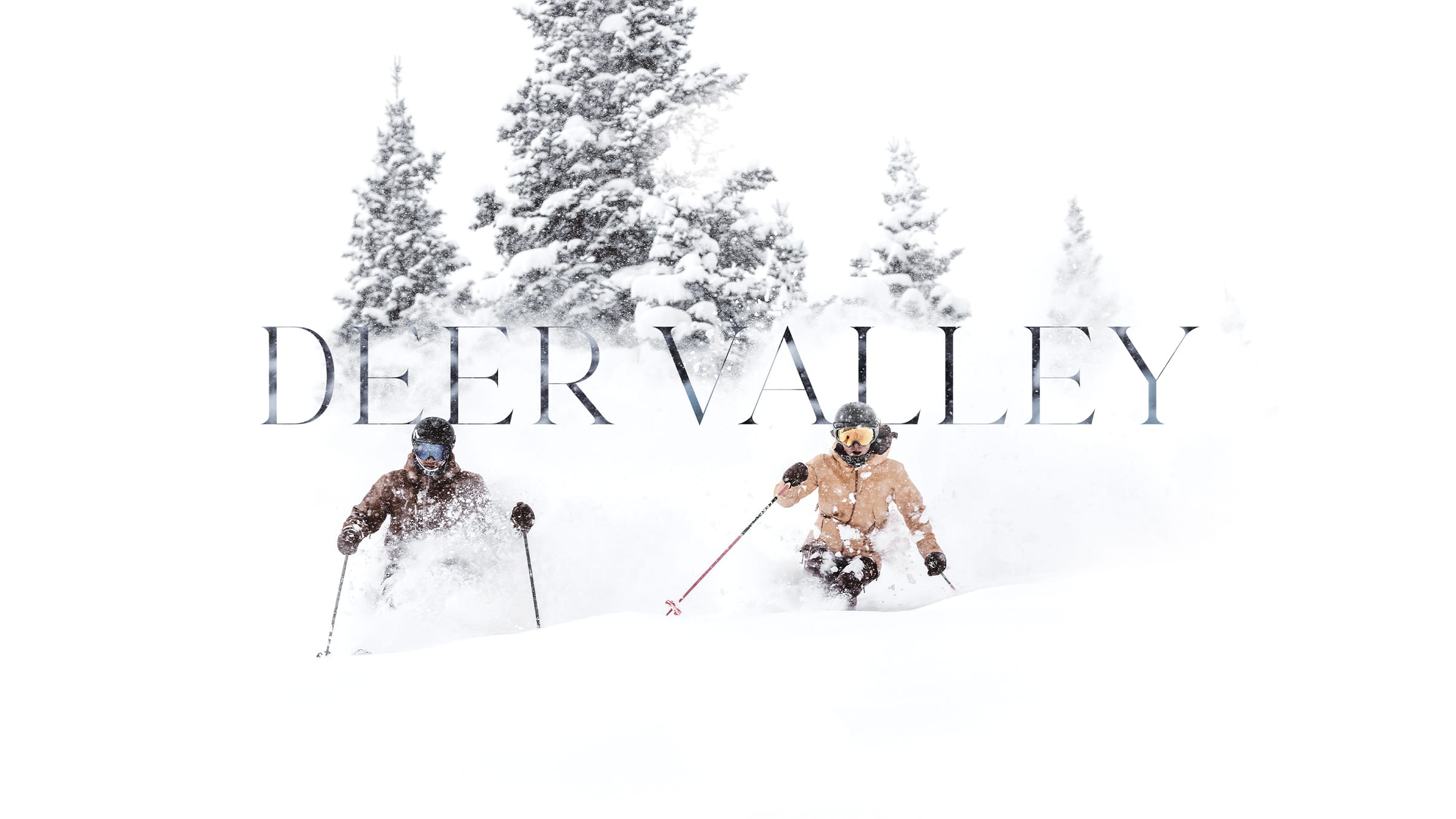 Skiers skiing in powder at Deer Valley Resort