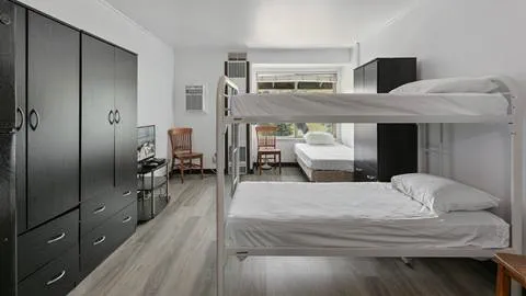 Image of beds in Prospector employee housing.