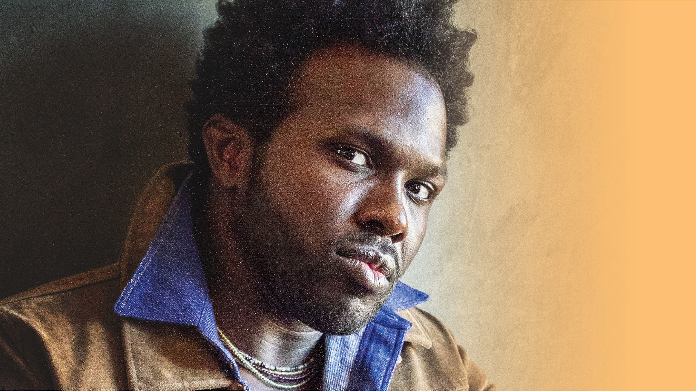 Musician, Joshua Henry, posing for professional headshot