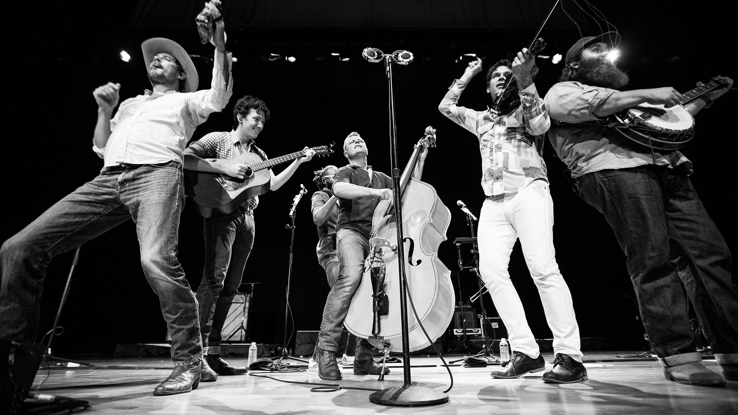 Old Crow Medicine Show band performing on stage.