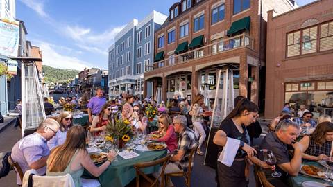 People dining outside on Main Street in Park City for the annual Savor the Summit event.