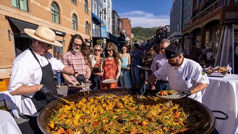 Deer Valley chef making paella outside on Main Street in Park City for the annual Savor the Summit event.