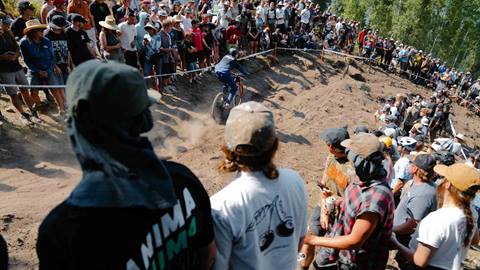 Spectators watching mountain biker competing at the US Open for Mountain Biking