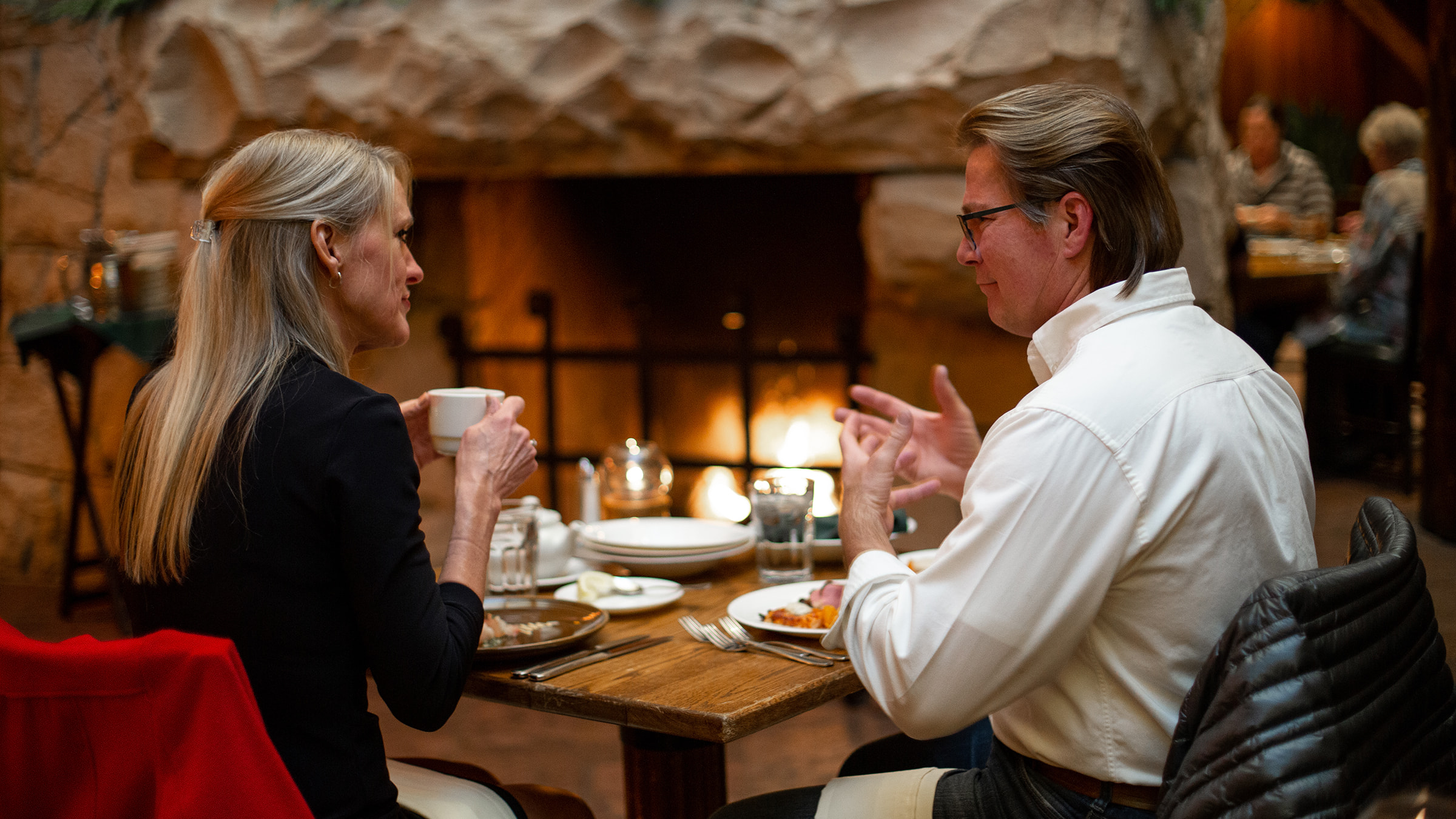 Couple talking over dinner