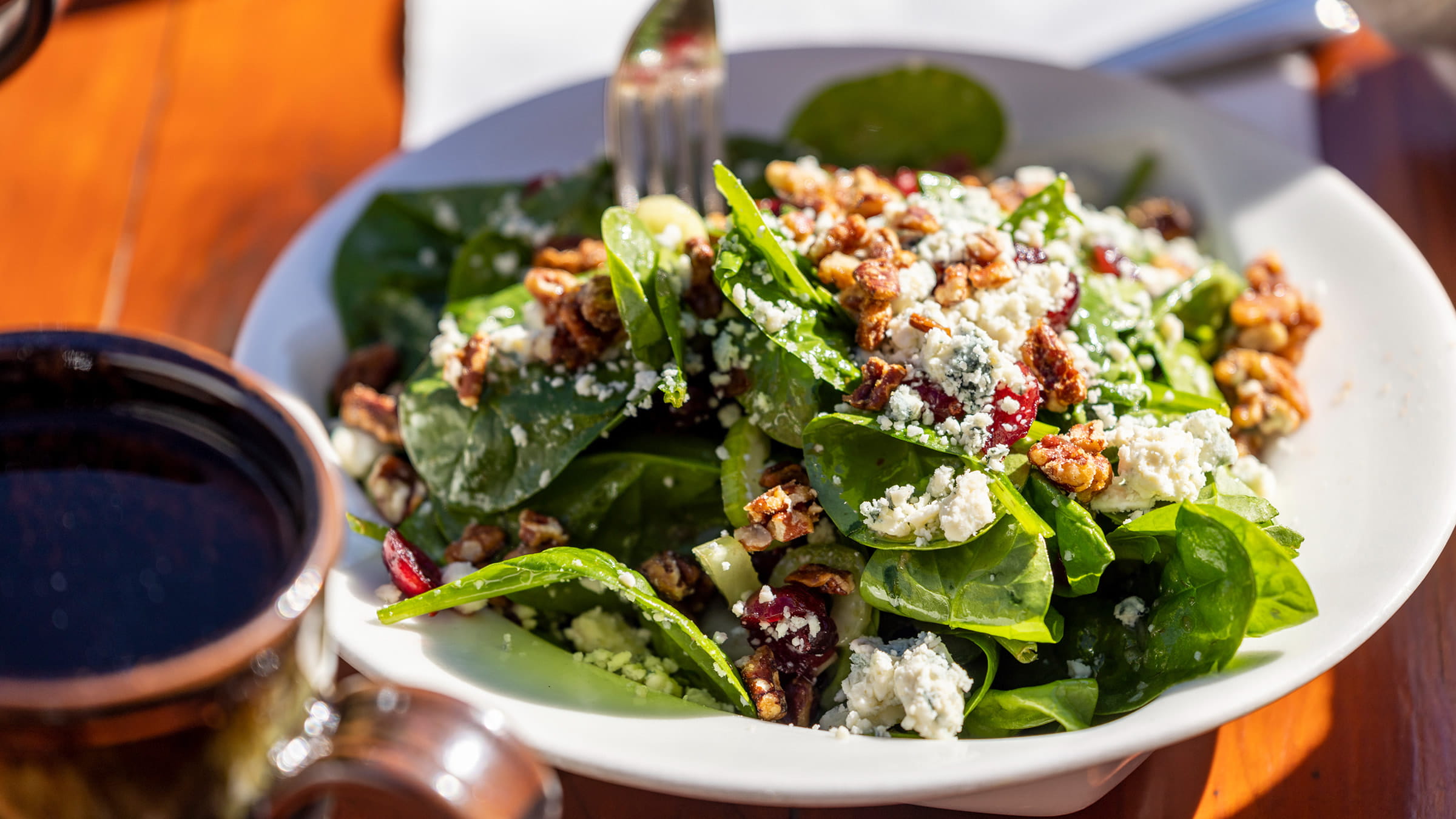 Deer Valley Café salad with fresh greens, nuts, and dried fruit.