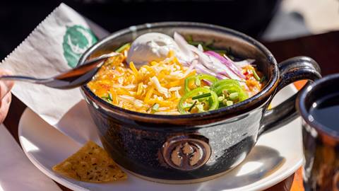 Deer Valley turkey chili served with shredded cheese and sour cream.
