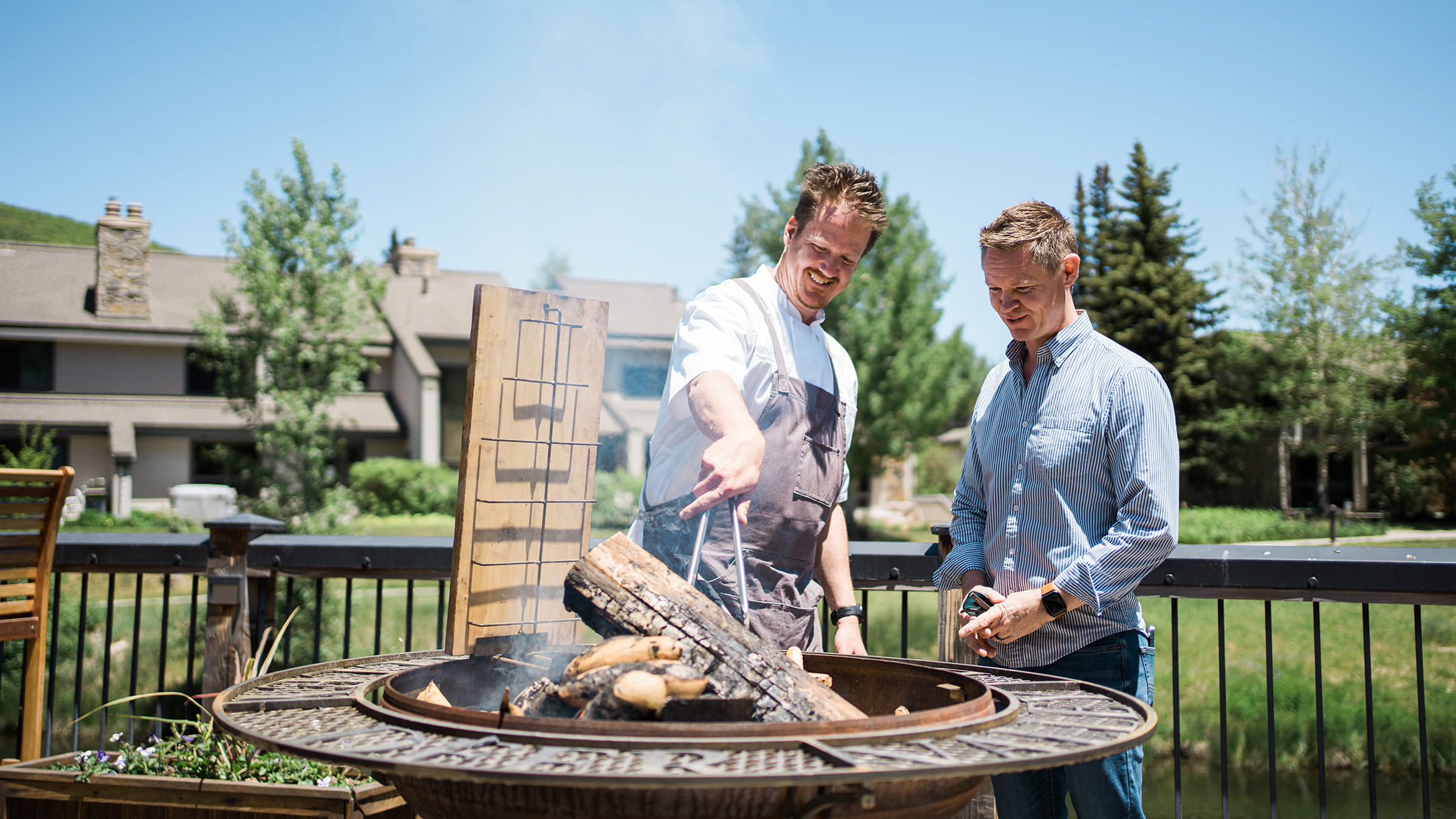 Deer Valley staff members cooking on the deck at Deer Valley Café. 
