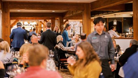 Guests dining inside at The Brass Tag.