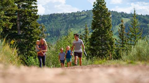 Family of five hiking at Deer Valley.