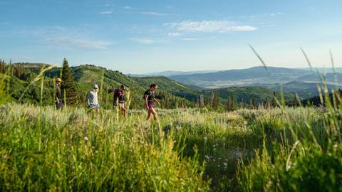 Friends hiking at Deer Valley in the summer.