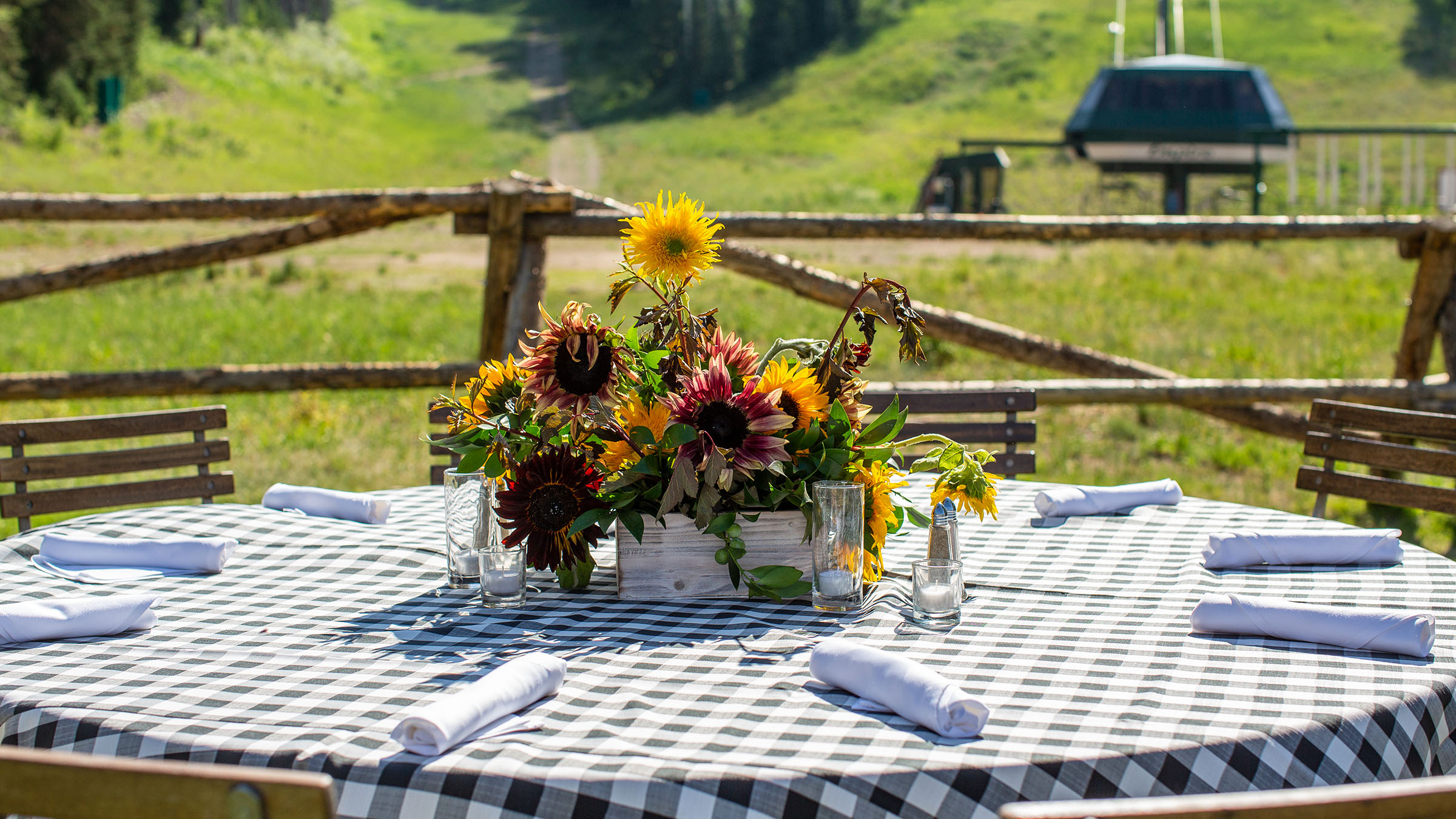 Flower arrangement displayed on table outside at Silver Lake.