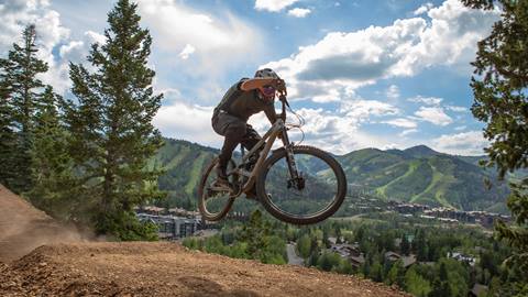 Man doing a trick on mountain bike at Deer Valley.