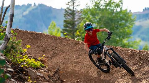 Boy mountain biking at Deer Valley.