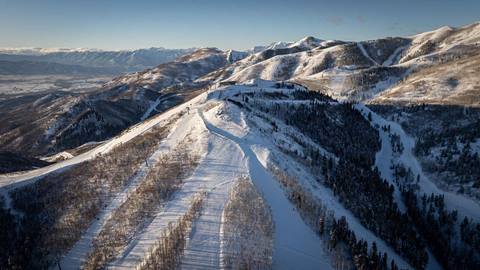 Aerial view of Park Peak and the Deer Valley East Village Gondola in winter.