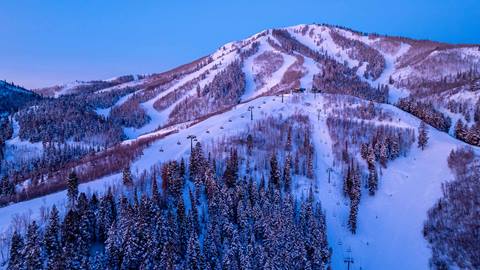 Sunrise over Deer Valley's Park Peak.