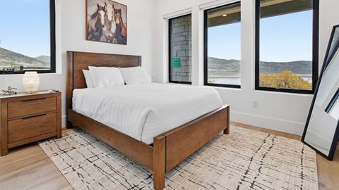 Bedroom with mountain views at Deer Valley's luxury lodging property, Amanti Lago 11346.