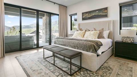 Bedroom with mountain views and hot tub access at Deer Valley's luxury lodging property, Amanti Lago 11427