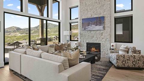 Living room with fireplace and mountain views at Deer Valley's luxury lodging property, Amanti Lago 11427