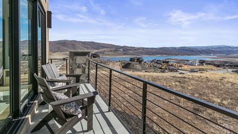 Private deck overlooking the lake at Deer Valley's lodging property Amanti Lago 1757.