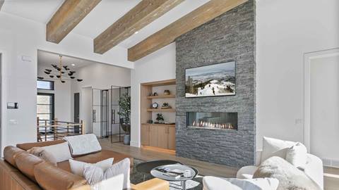 Living room with fireplace in Deer Valley's lodging property Amanti Lago 1757.