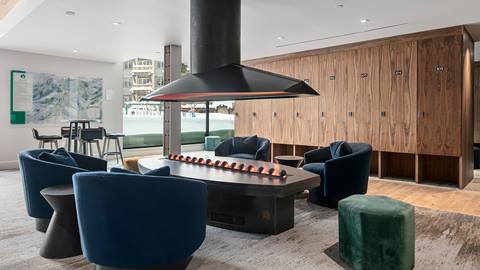 Argent at Empire Pass common area seating and steam fireplace