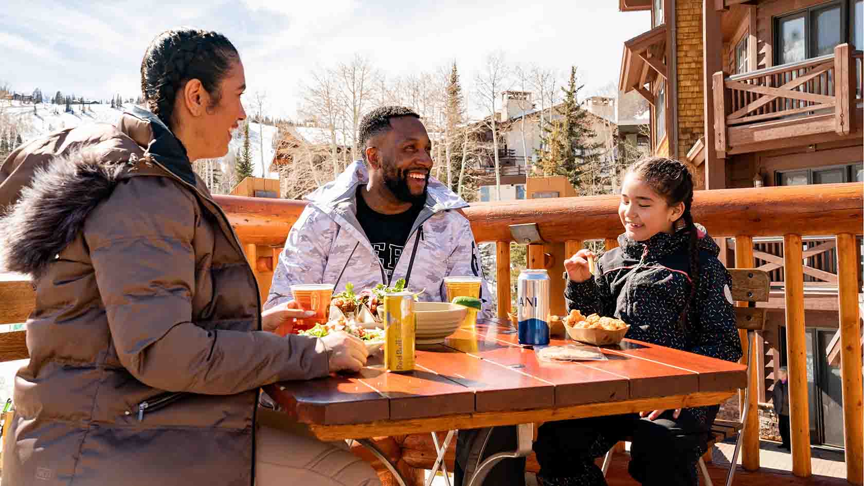 Family Eating Breakfast Outside