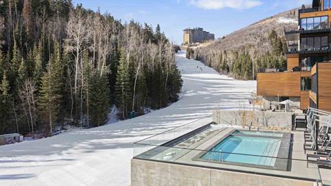 Heated pool with view of ski run at Deer Valley's lodging property, Founders Place.
