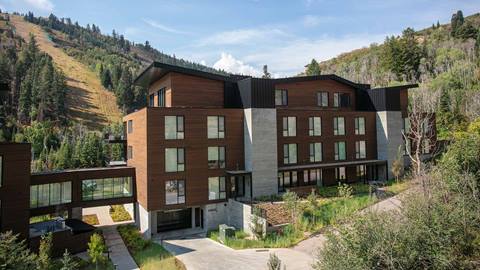 Summer exterior of Deer Valley's luxury lodging property Founders Place.