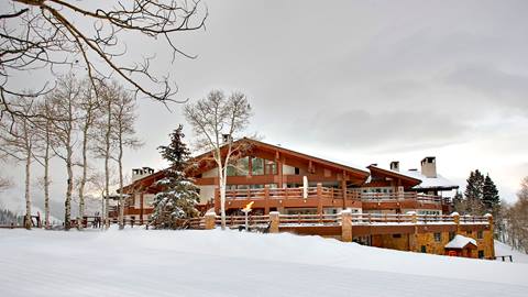 Exterior view of Stein Eriksen Lodge slope side during winter