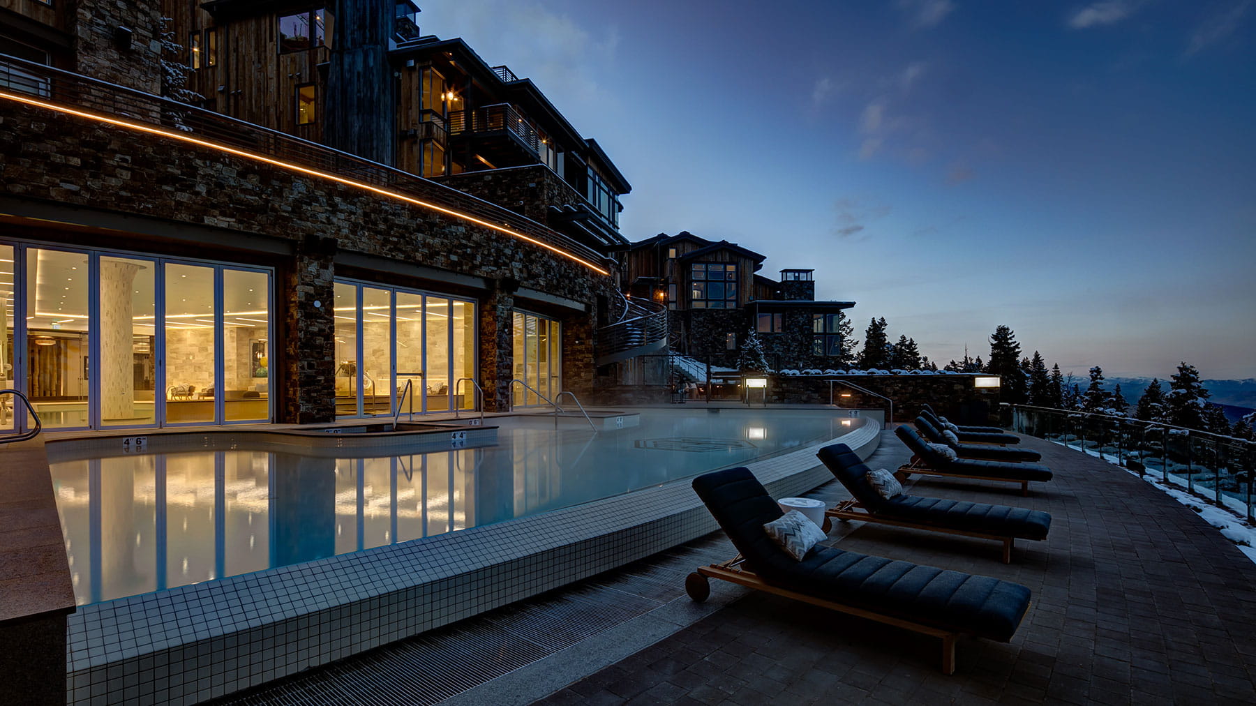 Stein Eriksen Residences Pool area at dusk