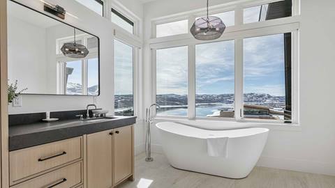 Master bathroom with bathtub and views in Deer Valley's luxury lodging property SkyRidge 1152