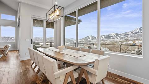 Dining room in SkyRidge 1307 with panoramic mountain views.