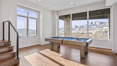 Pool table in SkyRidge 1307 with panoramic mountain views.