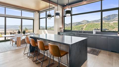 SkyRidge 1585 kitchen with tan leather bar stools