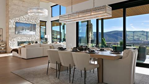 Dining room with mountain views inside Deer Valley's luxury lodging property, SkyRidge 1643.