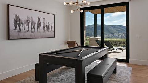 Pool table with mountain views inside Deer Valley's luxury lodging property, SkyRidge 1643.