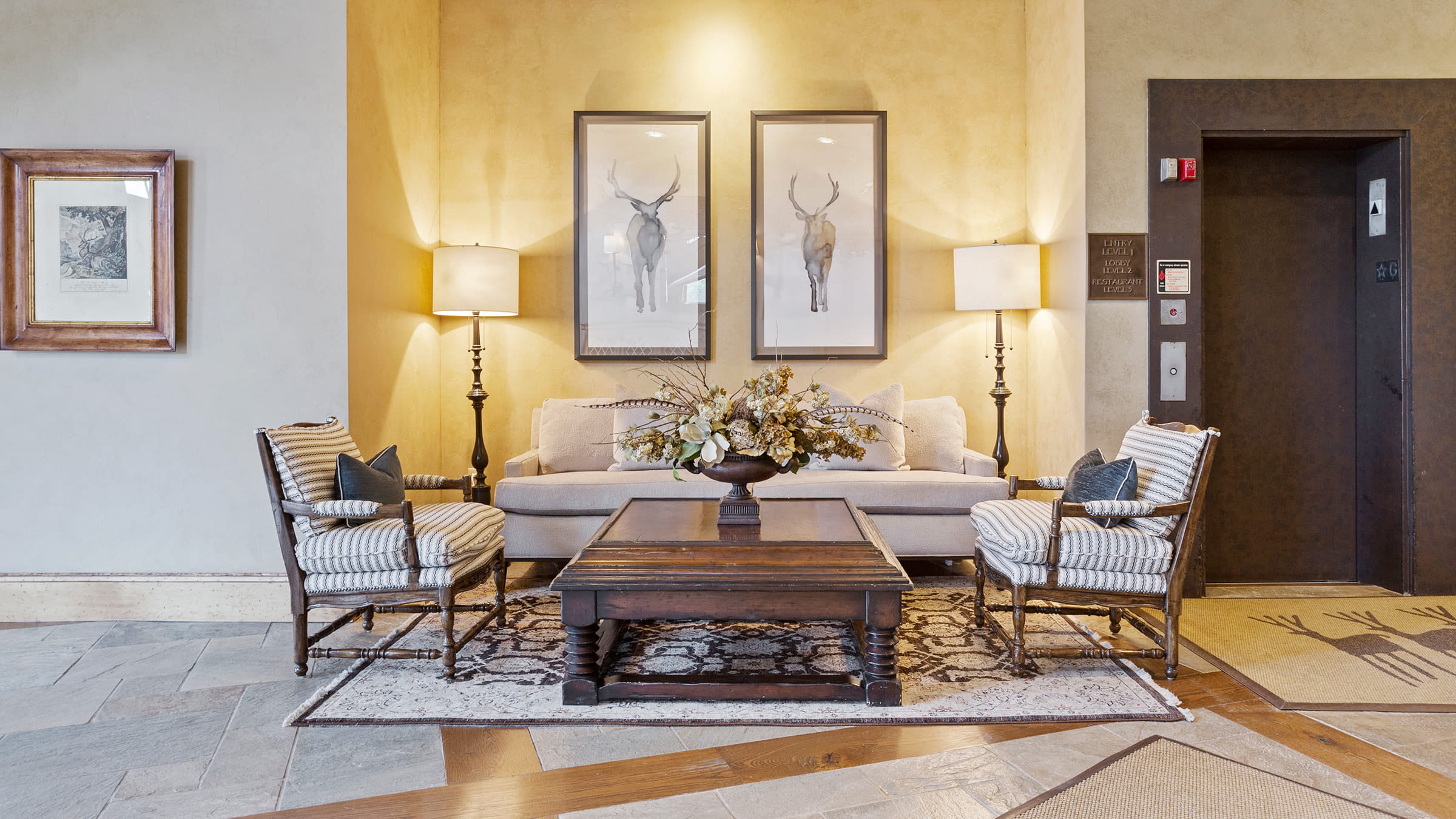 Entryway couch in Stag Lodge's common space, inviting and stylish.