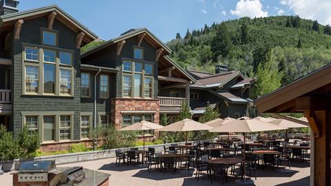 Lodges at Deer Valley outdoor patio during the summer.