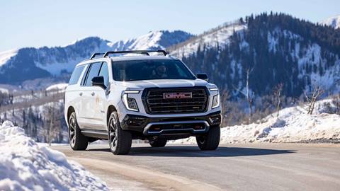 Man driving a GMC Yukon around Deer Valley Resort in Park City