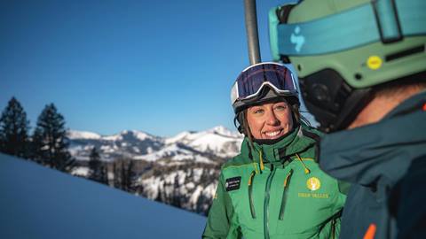 Deer Valley Ski Instructor and student on chairlift.